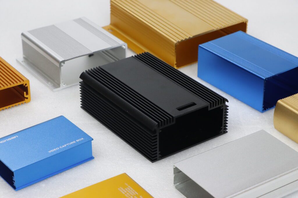 The image shows an aluminum enclosure with a silver finish. This natural or anodized silver finish is commonly used for industrial electronic enclosures. Key features of the silver aluminum finish: Lightweight: Aluminum is known for its light weight, making it ideal for enclosures where portability and ease of handling are important. Corrosion Resistance: The aluminum finish, especially if anodized, provides strong protection against rust and corrosion, which is important in both indoor and outdoor applications. Thermal Management: Aluminum has excellent thermal conductivity, helping to dissipate heat away from internal components, making it ideal for power-sensitive or high-performance electronics. Aesthetic Appeal: The clean, metallic look of the silver finish offers a professional and sleek appearance, commonly used in industrial settings, telecom, medical, and electronics equipment. Durability: Despite being lightweight, aluminum provides robust protection for sensitive components, making it suitable for demanding environments such as automotive, telecommunication, and industrial control systems. This type of silver aluminum enclosure is commonly used in industries requiring a balance of strength, light weight, and heat dissipation for electronic devices.